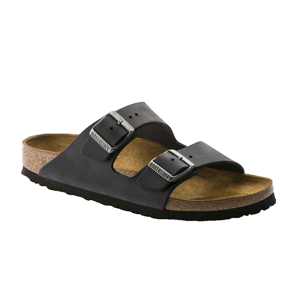 Sandali neri con due cinturini e fibbie. Plantare in sughero. Marchio Birkenstock sulle fibbie.
