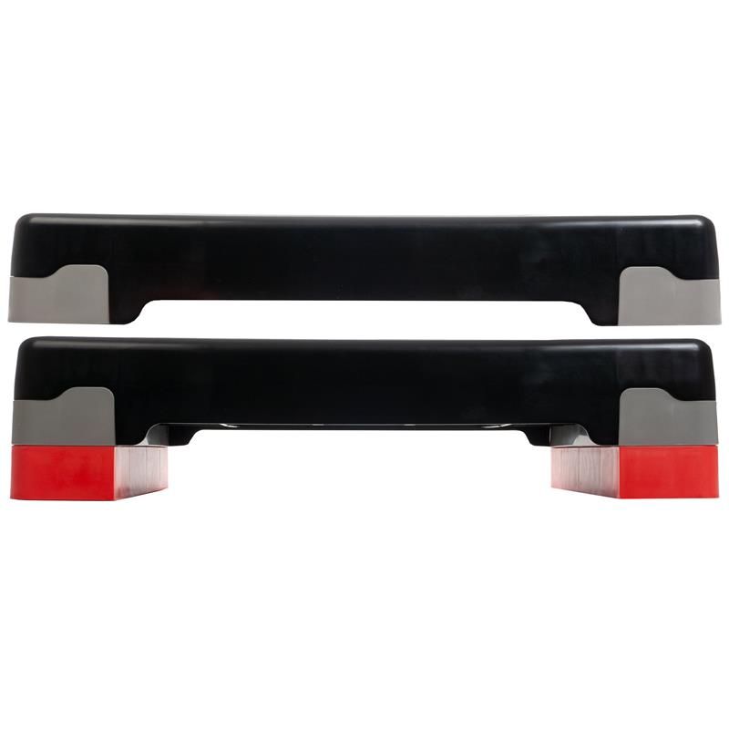 Zwei schwarze Stepper mit grauem und rotem Akzent. Seitenansicht. Kein Logo sichtbar.