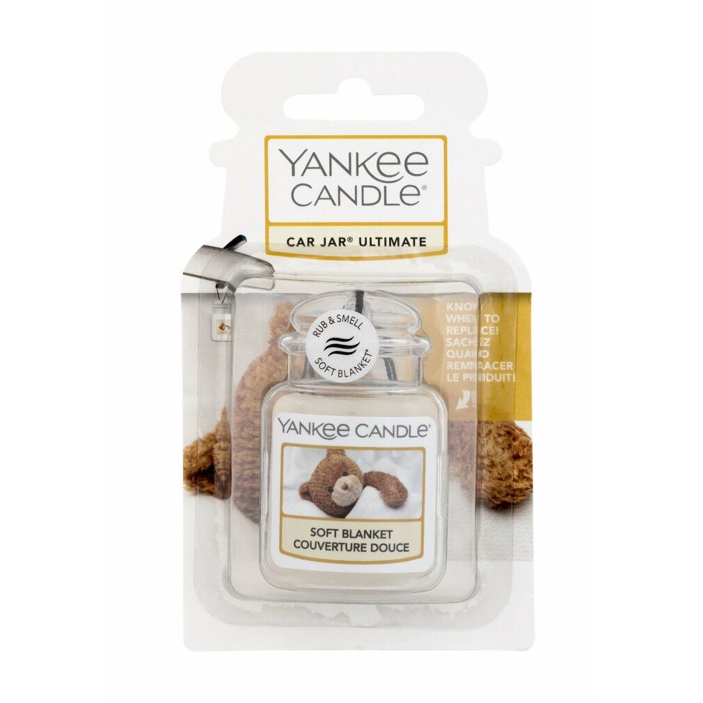 Lufterfrischer im Glasbehälter mit Deckel, in Blisterverpackung. Aufschrift: Soft Blanket. Marke: Yankee Candle.