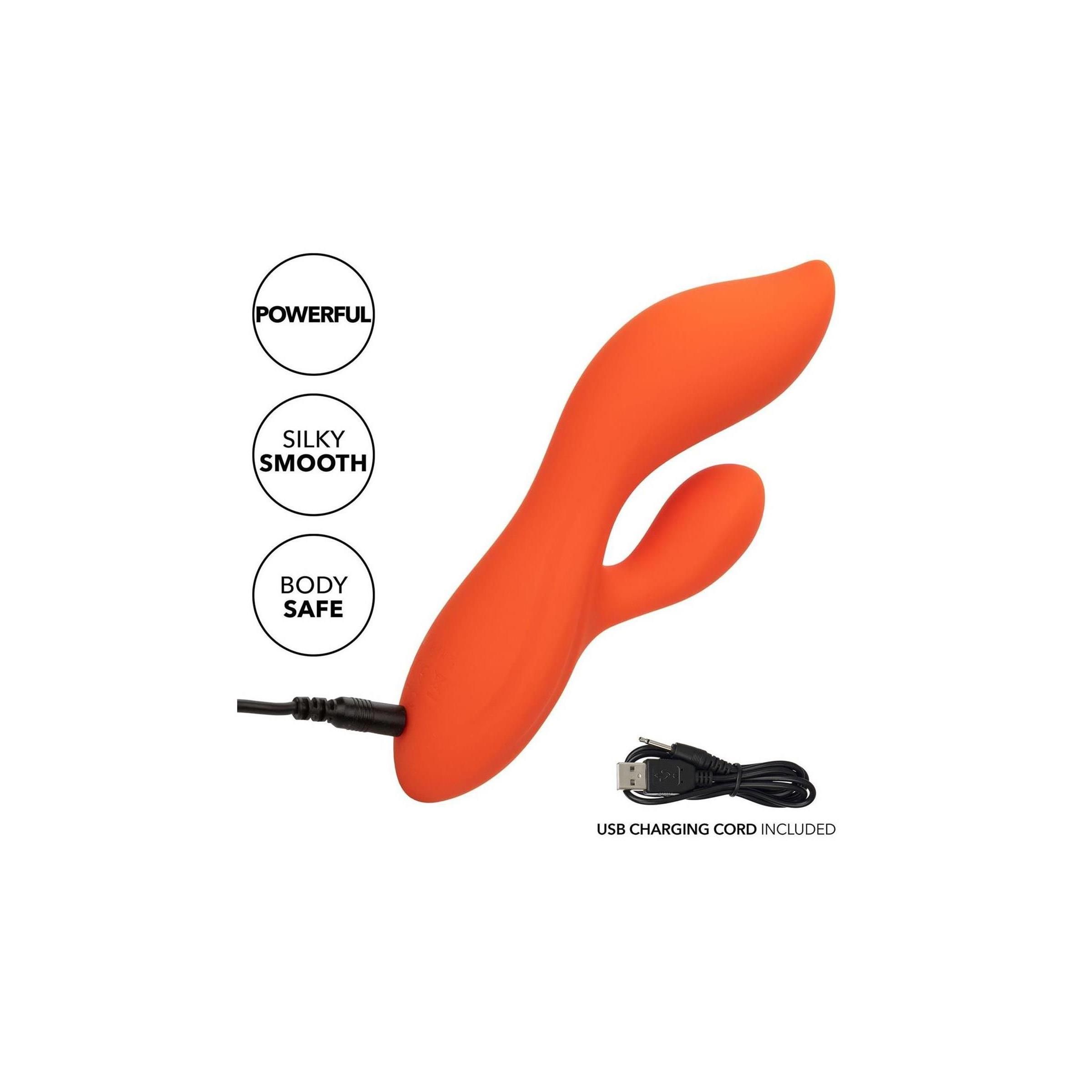 Orangefarbenes Wellness-Produkt mit USB-Ladekabel. Aufschrift: "Powerful", "Silky Smooth", "Body Safe".