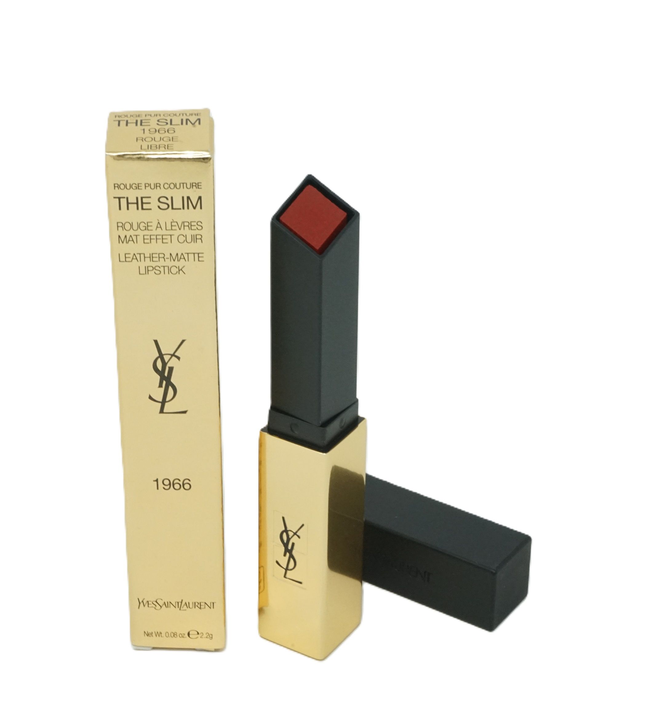 Goldener Lippenstift mit schwarzem Deckel und goldener Verpackung. Aufschrift: YSL, THE SLIM 1966.