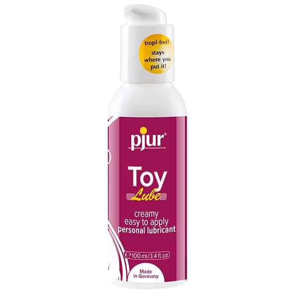 Weiße Flasche mit Pumpkopf. Aufschrift "pjur Toy Lube". Gelber Aufkleber "tropf-frei!". Rote und weiße Etiketten mit Text.