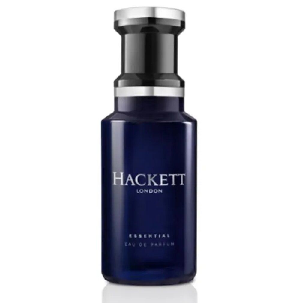 Dunkelblaue Flasche mit silbernem Verschluss. Aufschrift: HACKETT LONDON ESSENTIAL EAU DE PARFUM.
