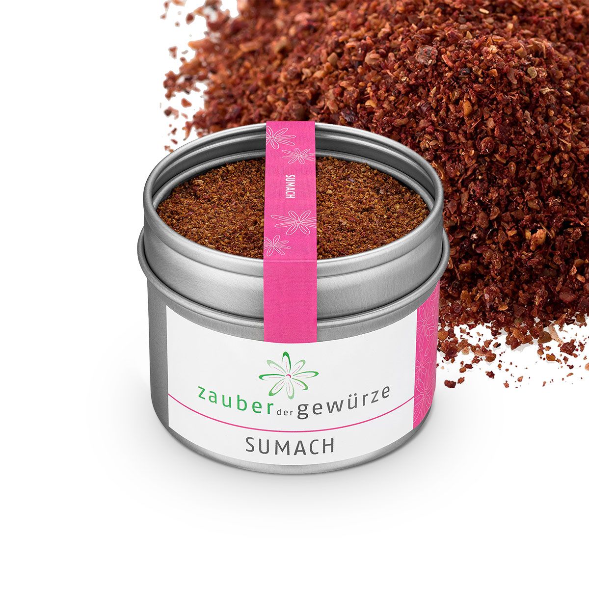 Runde Dose mit Sumach-Gewürz, daneben Sumach-Haufen. Rosa Etikett mit Blumenmuster und Produktnamen. Weißes Etikett mit Schriftzug "Zauber der Gewürze".
