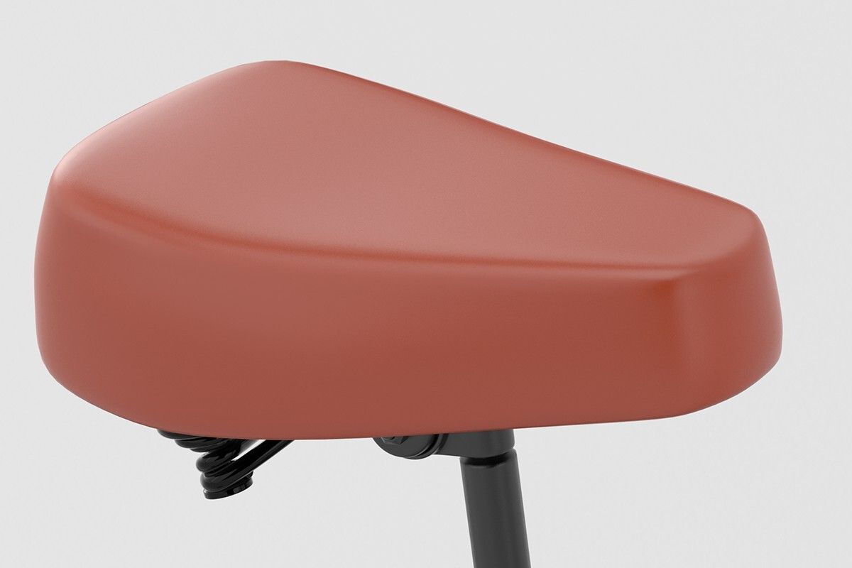 Brauner Fahrradsattel. Schwarze Halterung. Federung sichtbar. Nahaufnahme.