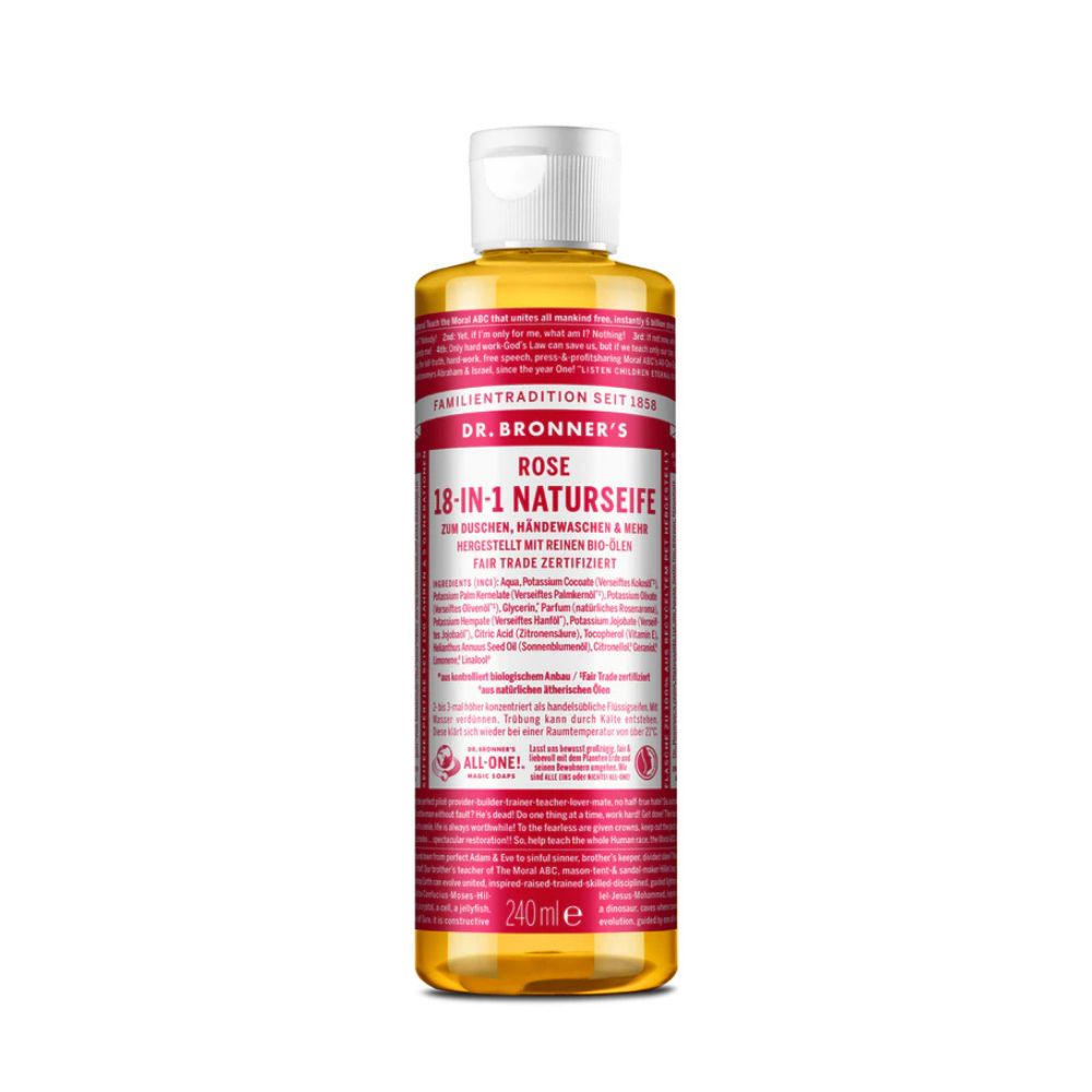 Rose Naturseife in einer durchsichtigen Flasche mit weißem Deckel. Aufschrift: DR. BRONNER'S, 18-in-1 Naturseife.