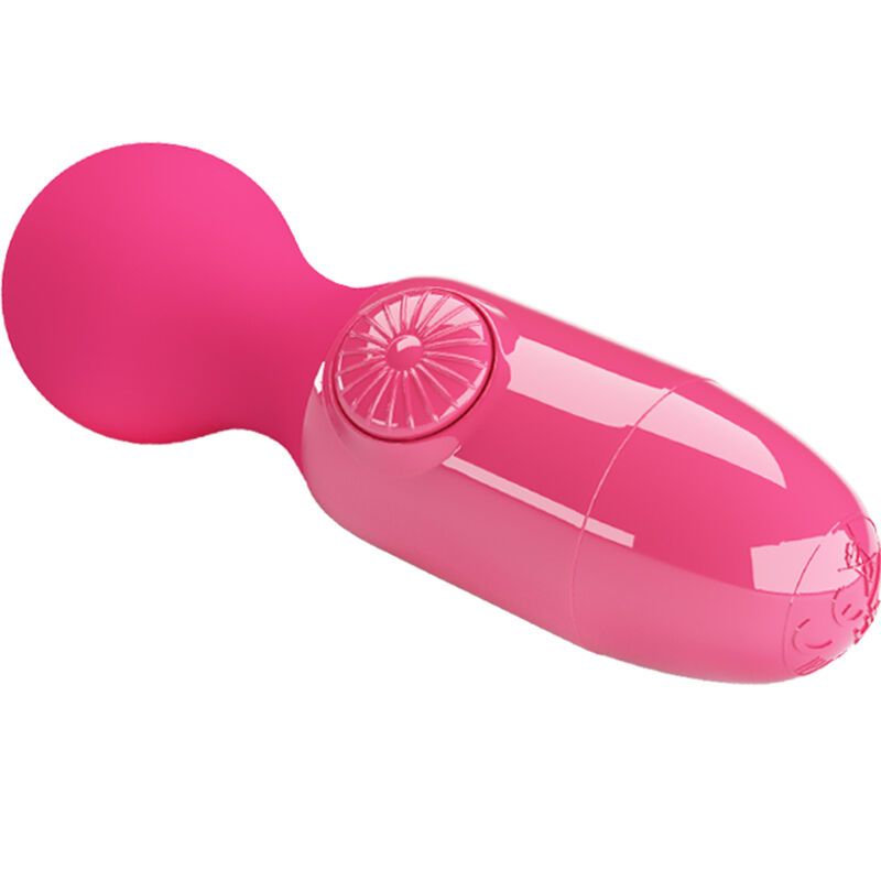 Magenta Mini Massager. Abgerundeter Kopf, zylindrischer Körper. Bedienfeld mit Knöpfen. Schräge Ansicht.