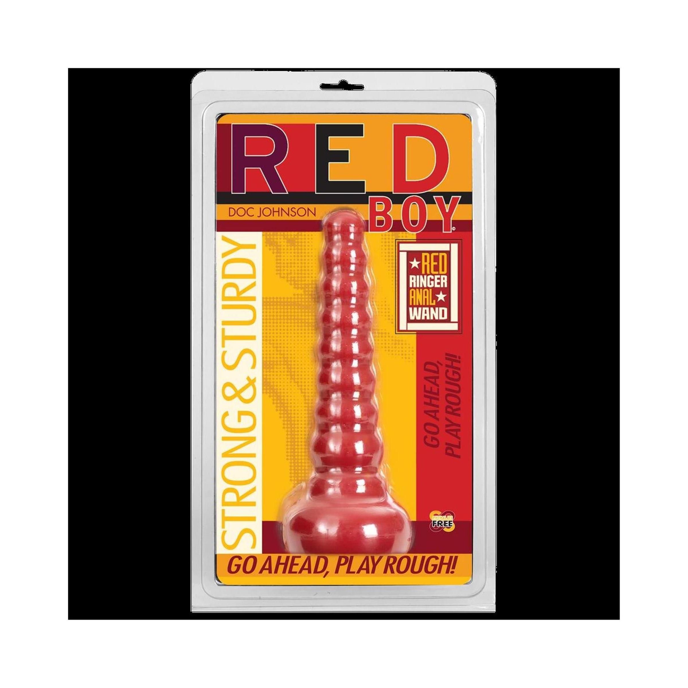Roter Anal-Wand in Blisterverpackung. Aufschrift "RED BOY" und "Doc Johnson". Gelbe und rote Akzente. "STRONG & STURDY".