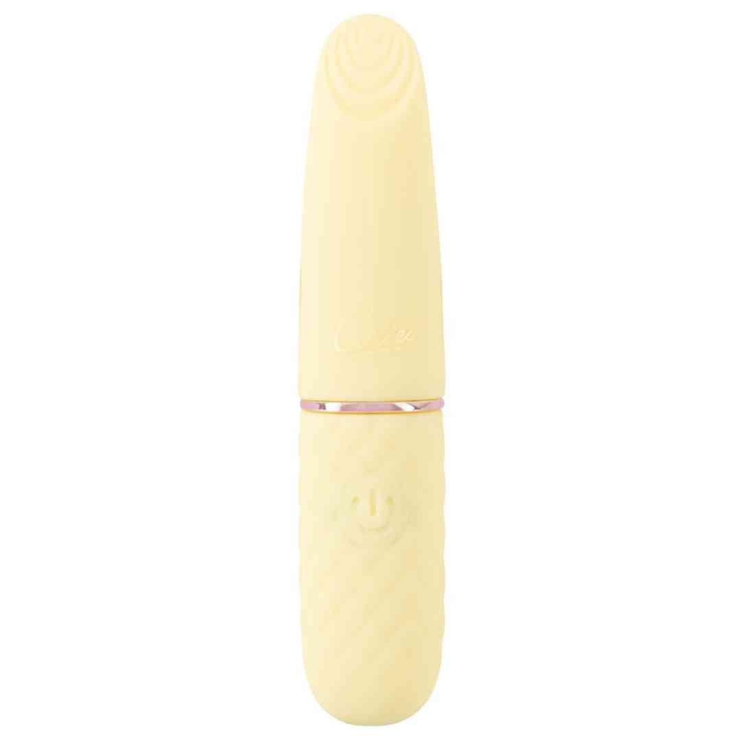 Gelber Vibrator mit geriffelter Spitze und strukturiertem Griff. Mit goldfarbenem Ring. Ein/Aus-Taste.