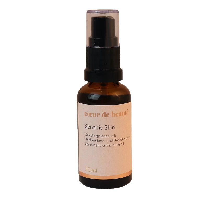 Braune Glasflasche mit schwarzem Pumpkopf. Aufschrift: Coeur de Beauté, Sensitiv Skin, Gesichtspflegeöl. 30 ml.