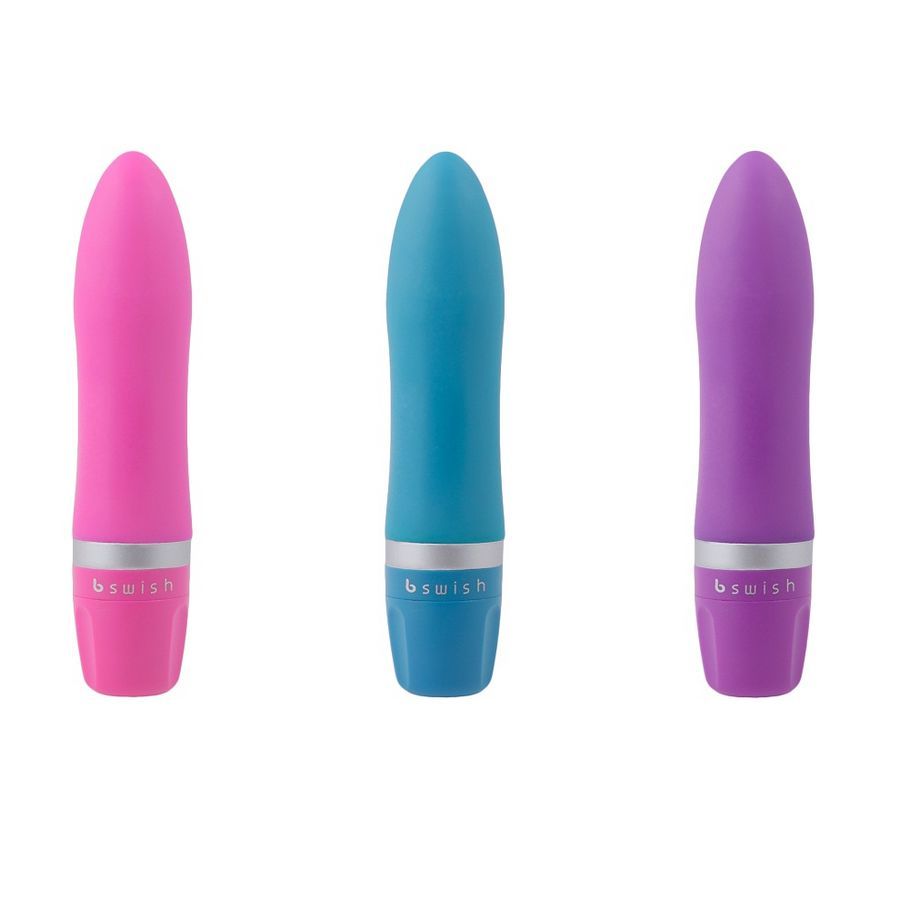 Drei Vibratoren in Pink, Blau und Lila. Marke B Swish ist sichtbar.