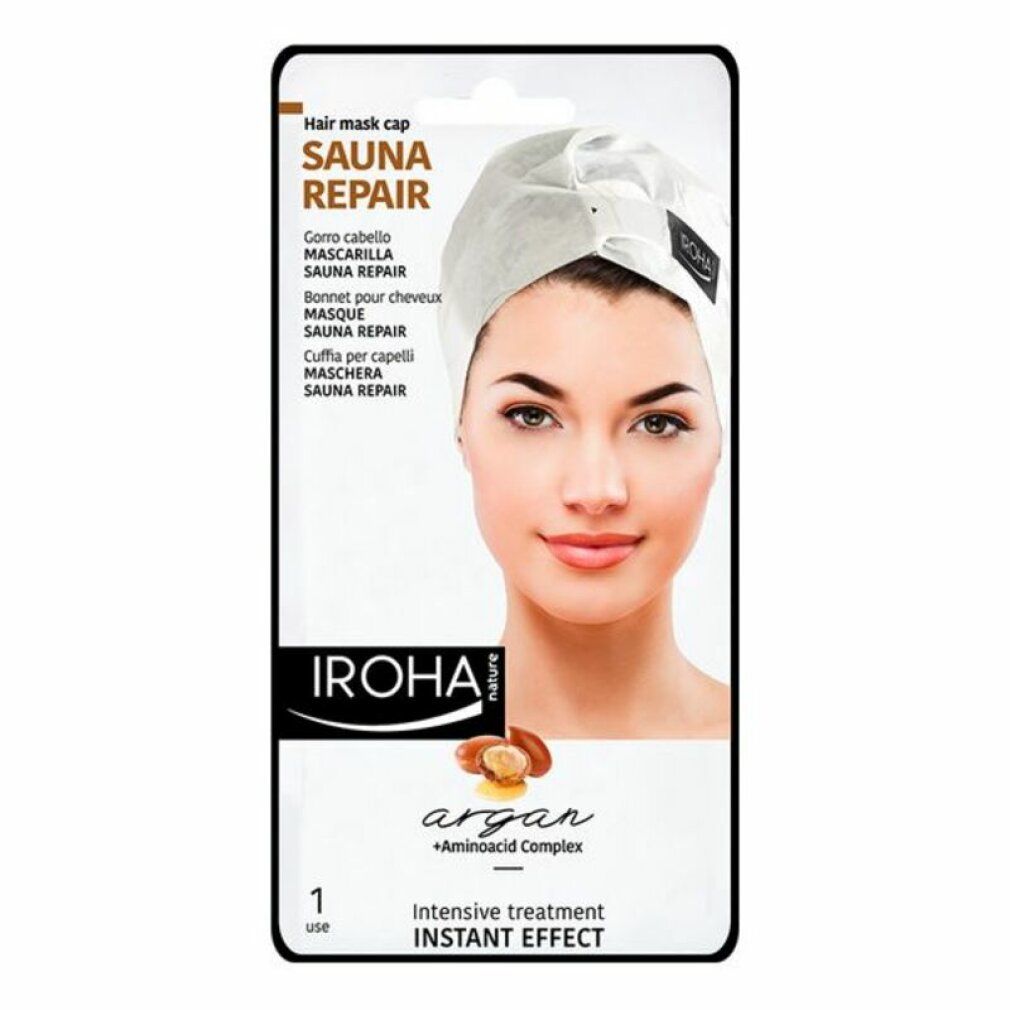 Verpackung mit Iroha Hair Mask Argan. Aufdruck: Sauna Repair, Argan + Aminoacid Complex. Frau mit Haarmaske. 1 Anwendung.