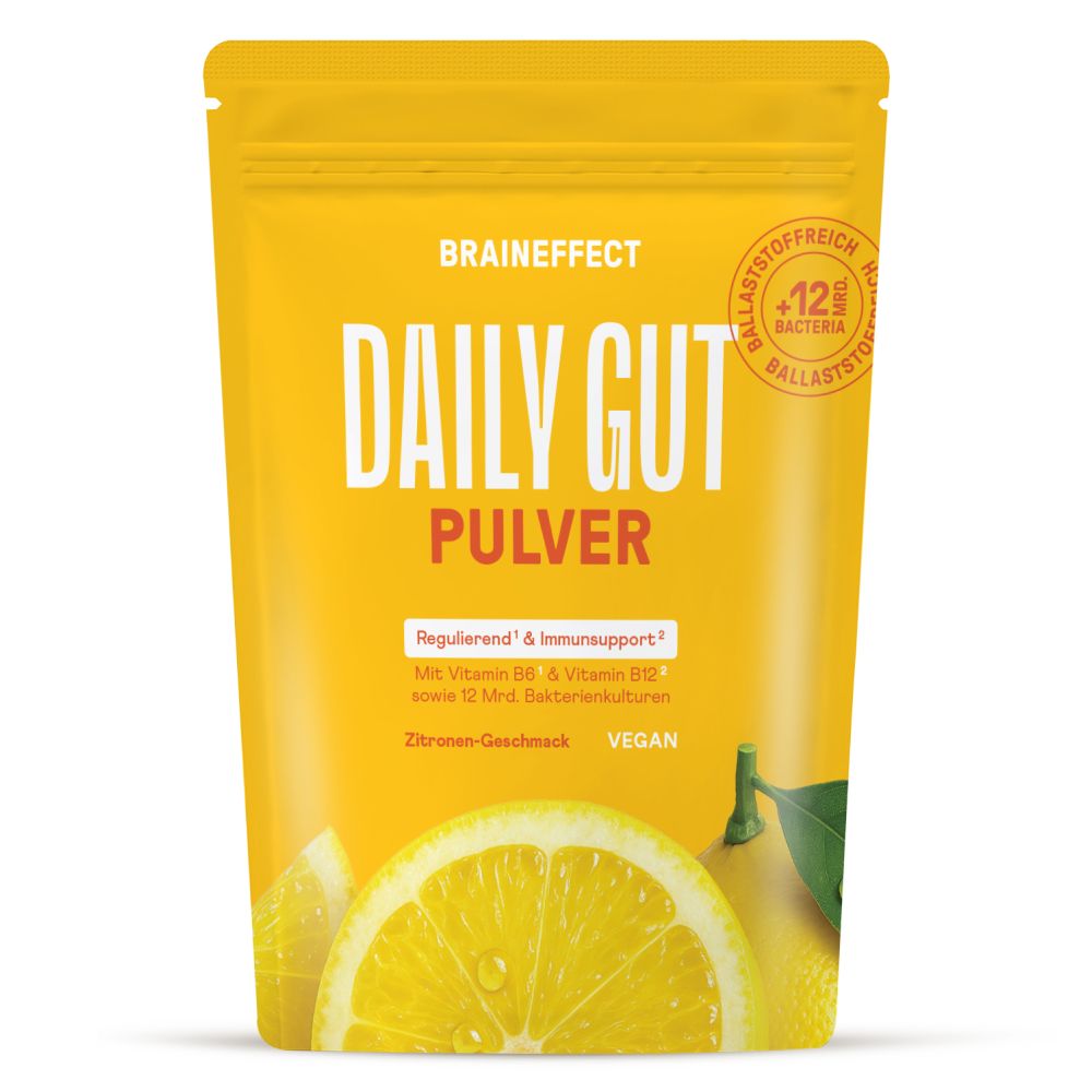 Gelbe Pulverpackung mit der Aufschrift "BRAINEFFECT DAILY GUT PULVER Zitrone". Enthält Ballaststoffe, Bakterienkulturen und Vitamine.