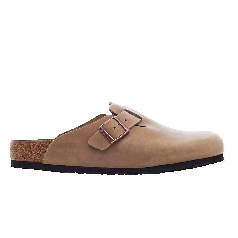 Zoccolo beige con fibbia. Suola in sughero, tomaia in pelle. Vista laterale.