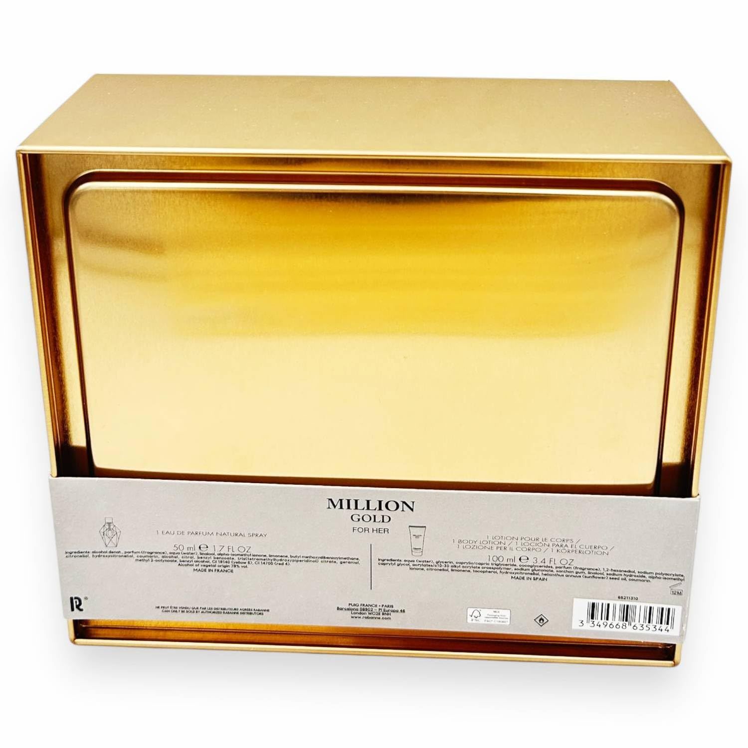 Goldene Geschenkbox mit Produktinformationen. Enthält Flakon und Bodylotion. Text mit Produktnamen und Inhaltsstoffen.