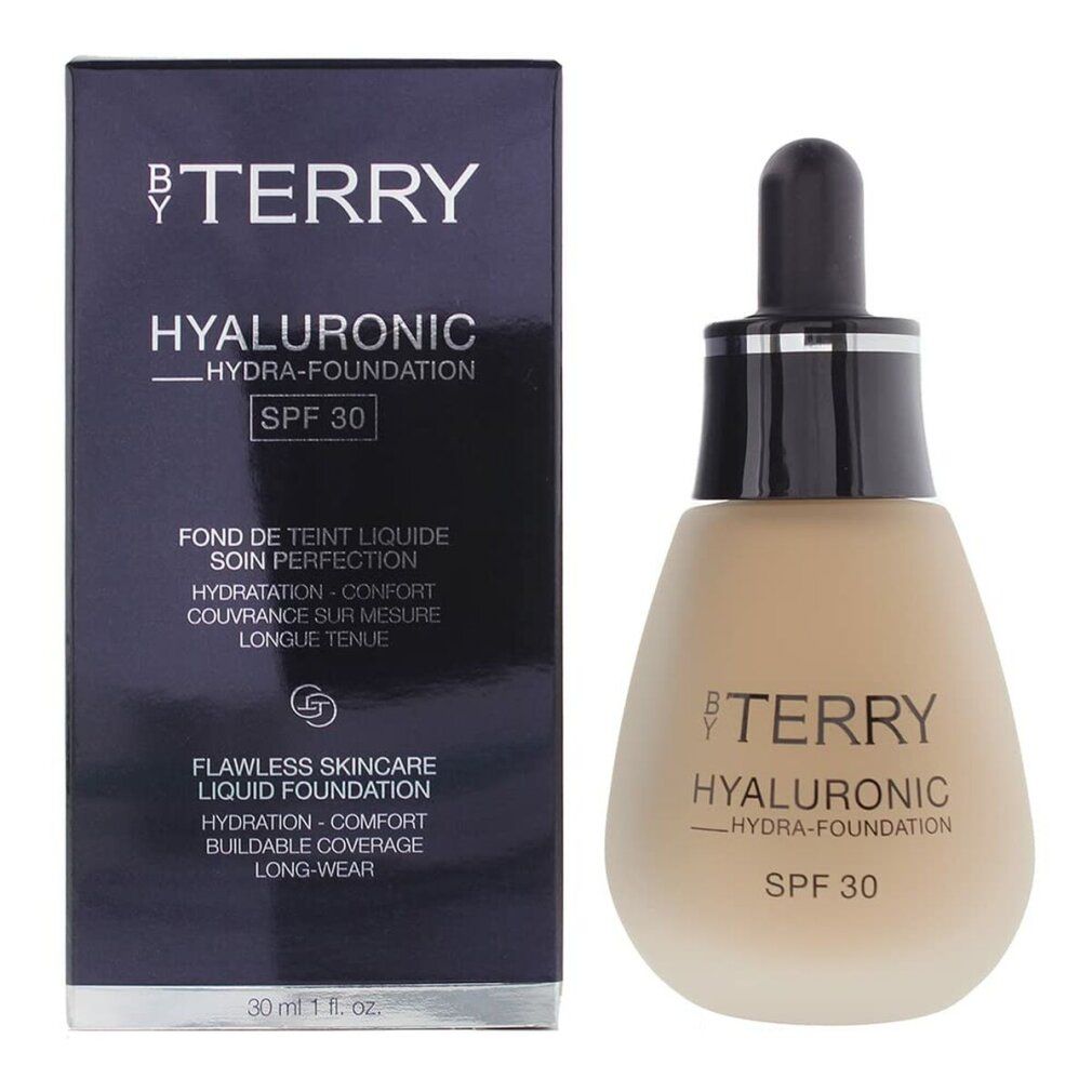 By Terry Hyaluronic Hydra Foundation. Flasche und Verpackung. Farbton Medium-Warm. SPF 30. Text.