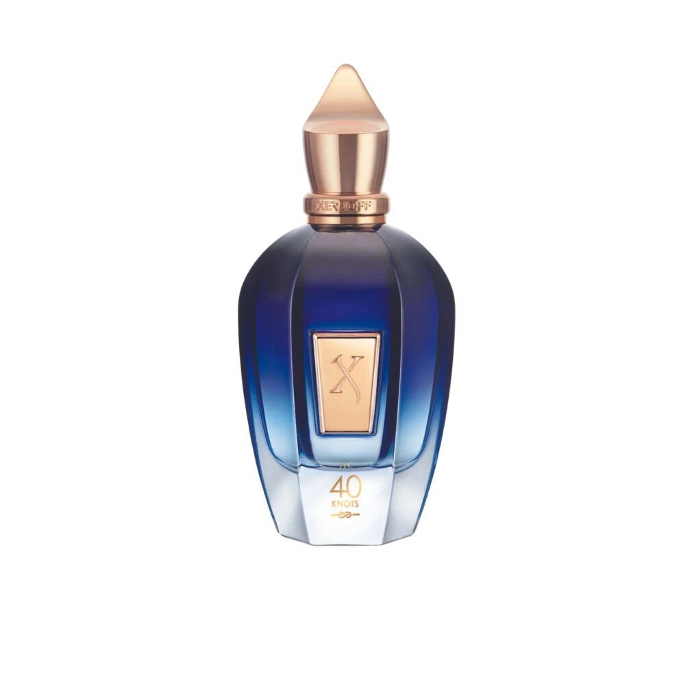 Blau-transparenter Flakon mit goldfarbenem Verschluss. Goldfarbenes Etikett mit 'X' und '40 Knots'.