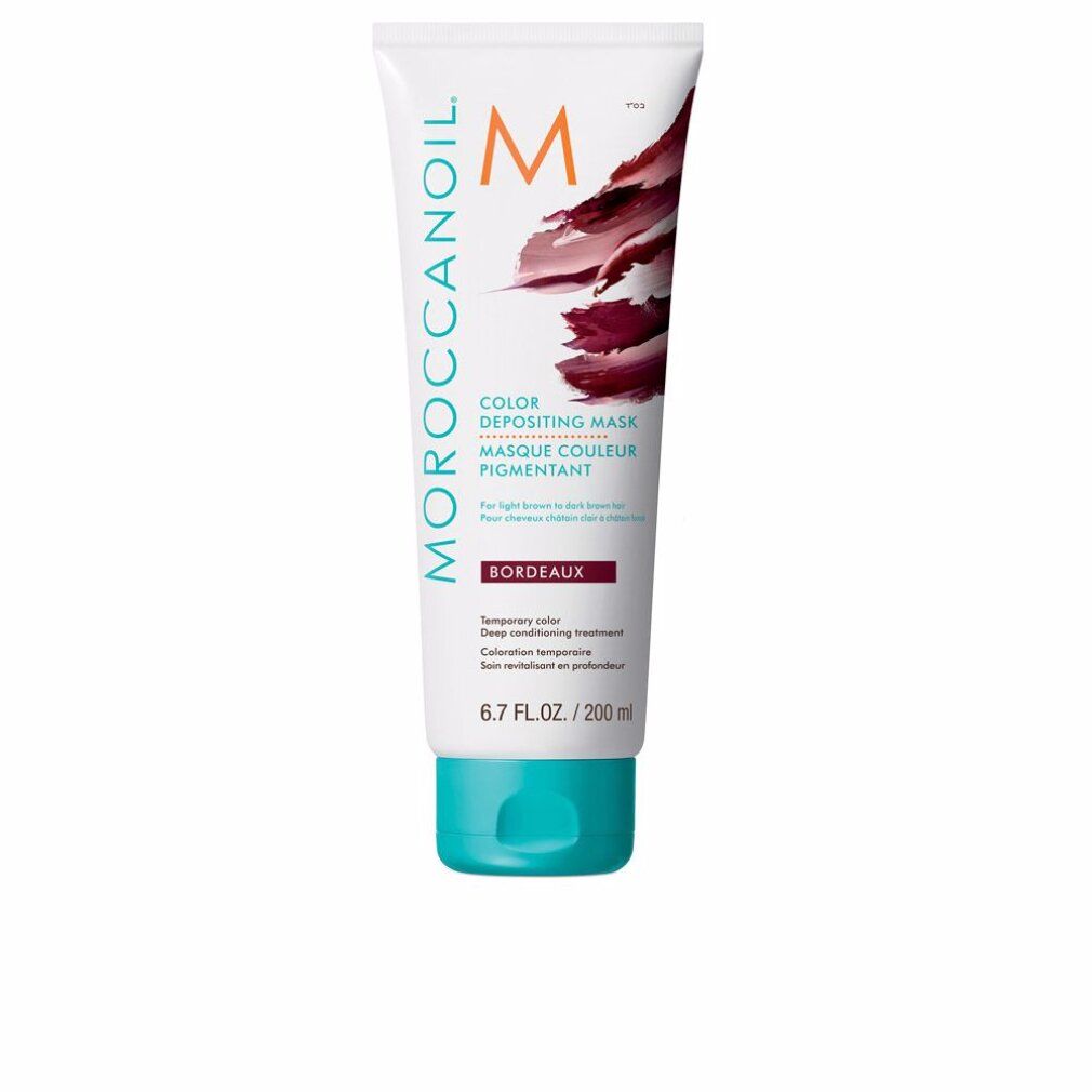 Moroccanoil Color Depositing Mask Bordeaux. Weiße Tube mit bordeauxfarbenem Farbverlauf. Türkisgrüner Deckel. Text: Color Depositing Mask.