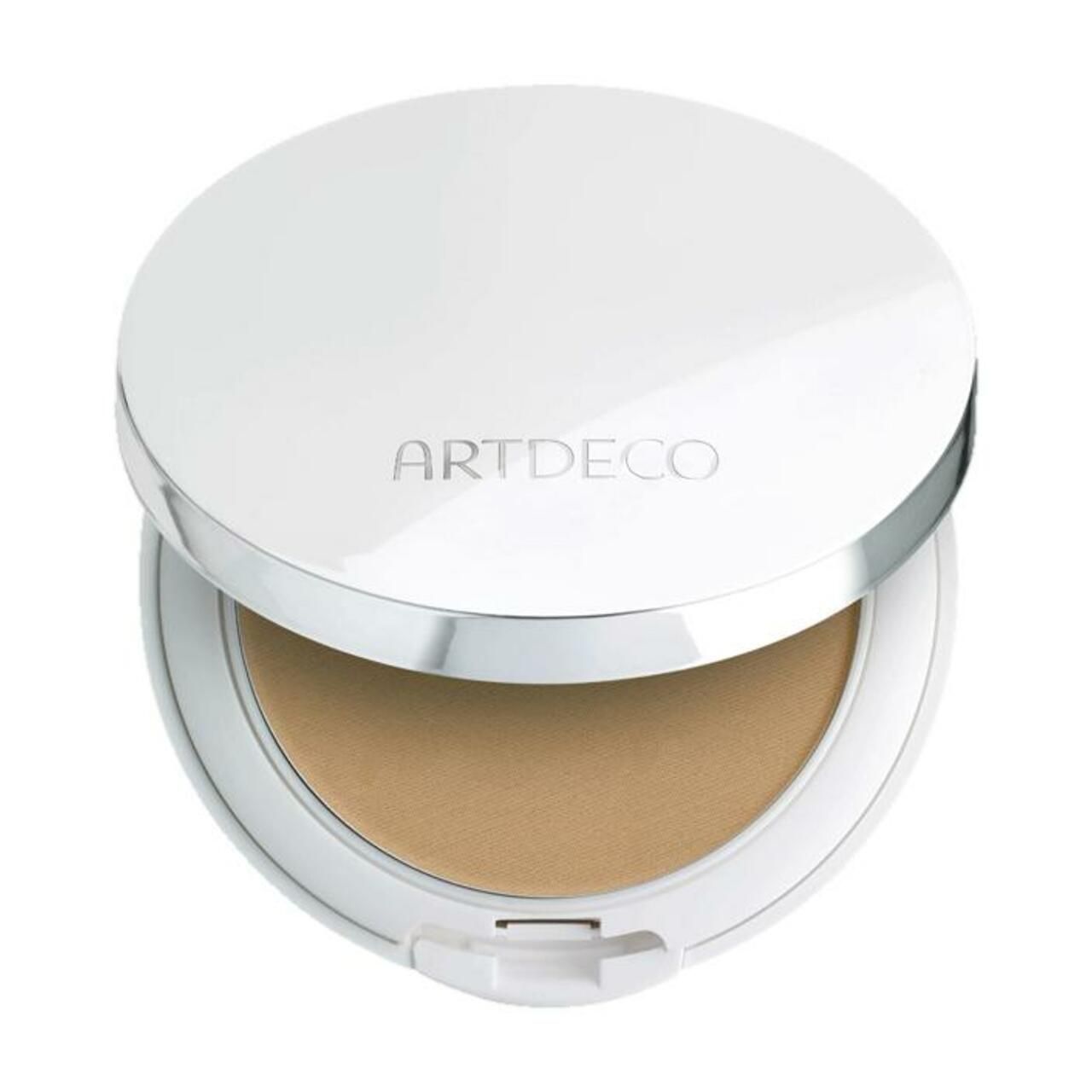 Weißer, runder Make-up-Kompaktpuder mit silberfarbenem Rand. Auf dem Deckel steht ARTDECO. Der Puder ist geöffnet.