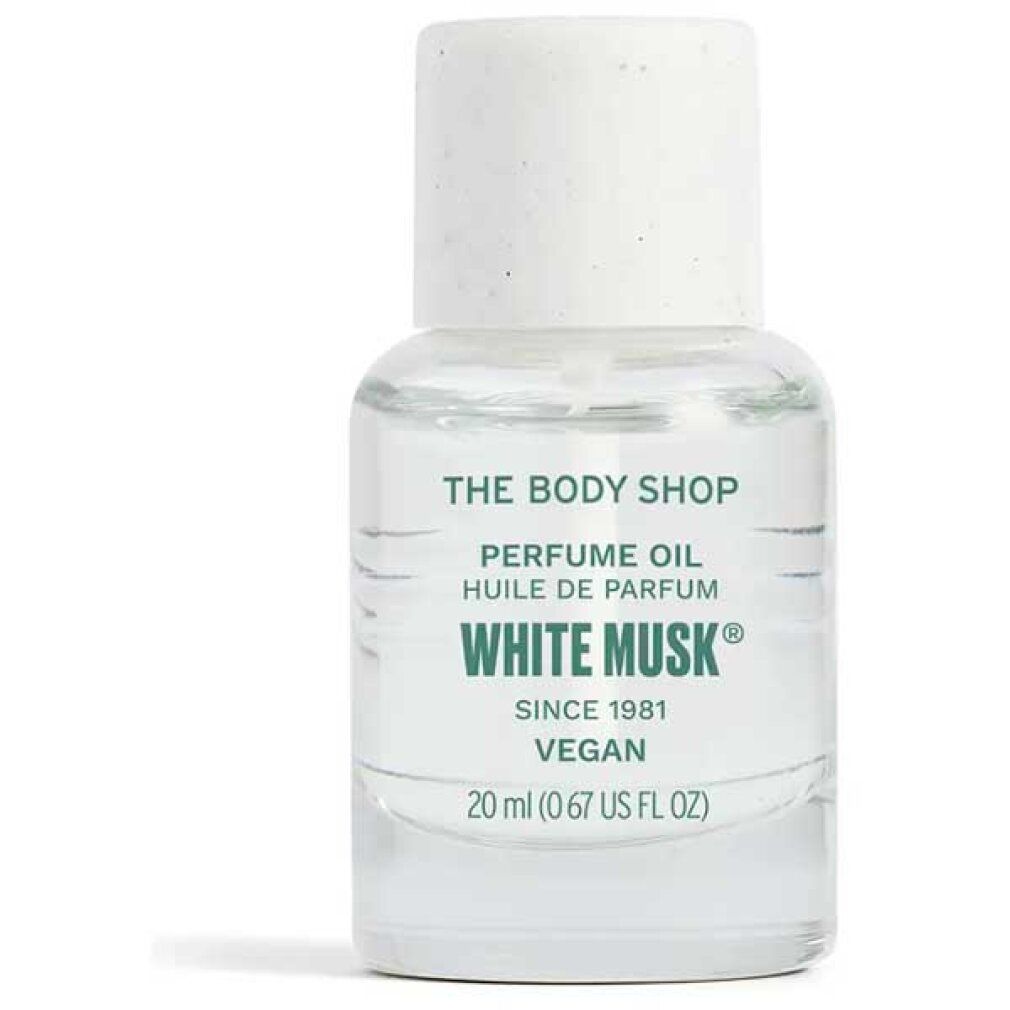 Klarflüssiges Parfümöl in einer kleinen Glasflasche mit weißem Deckel. Aufschrift: White Musk, Vegan, The Body Shop.