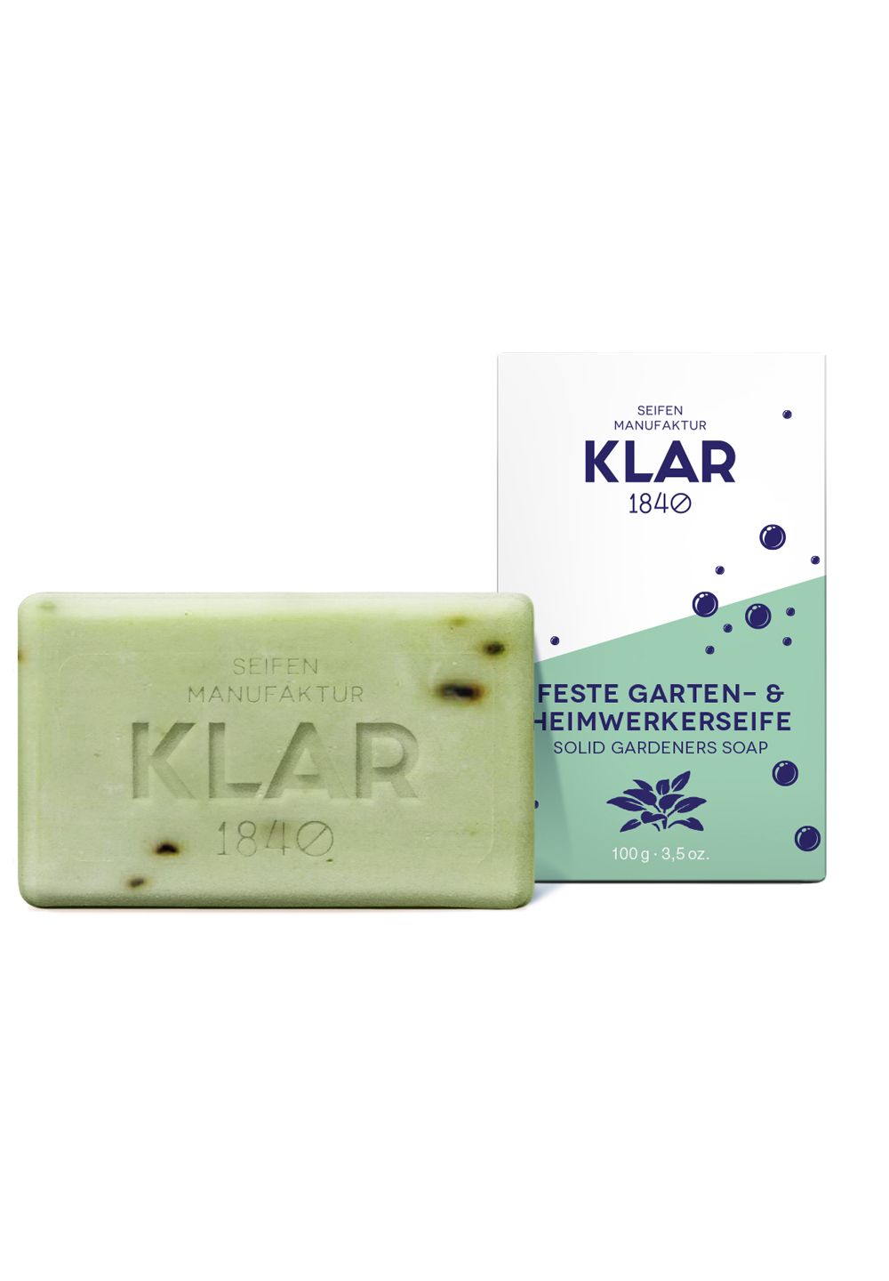 Grüne Seife mit Aufdruck "KLAR 1840" und Verpackung. Auf der Verpackung steht "Feste Garten- & Heimwerkerseife".