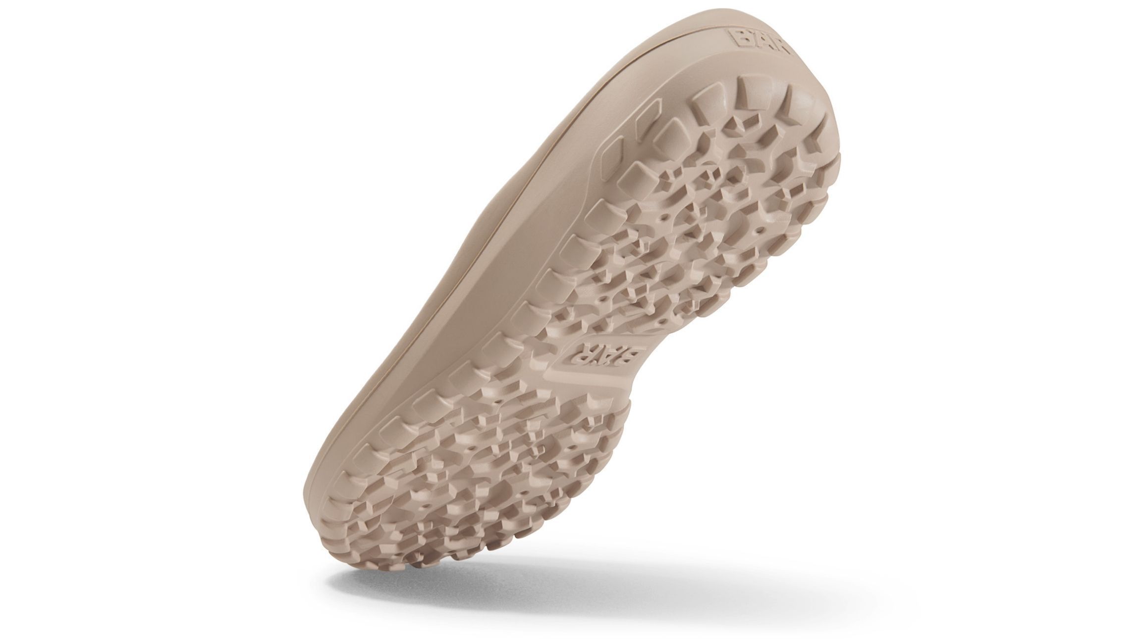 Unterseite eines Schuhs. Beige Sohle mit Profil. Logo.