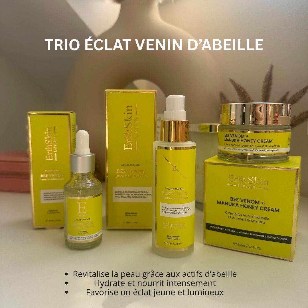 ErthSkin-Trio mit Serum, Creme und Öl. Gelbe Verpackung mit Text. Produkte auf gelben Schachteln platziert.