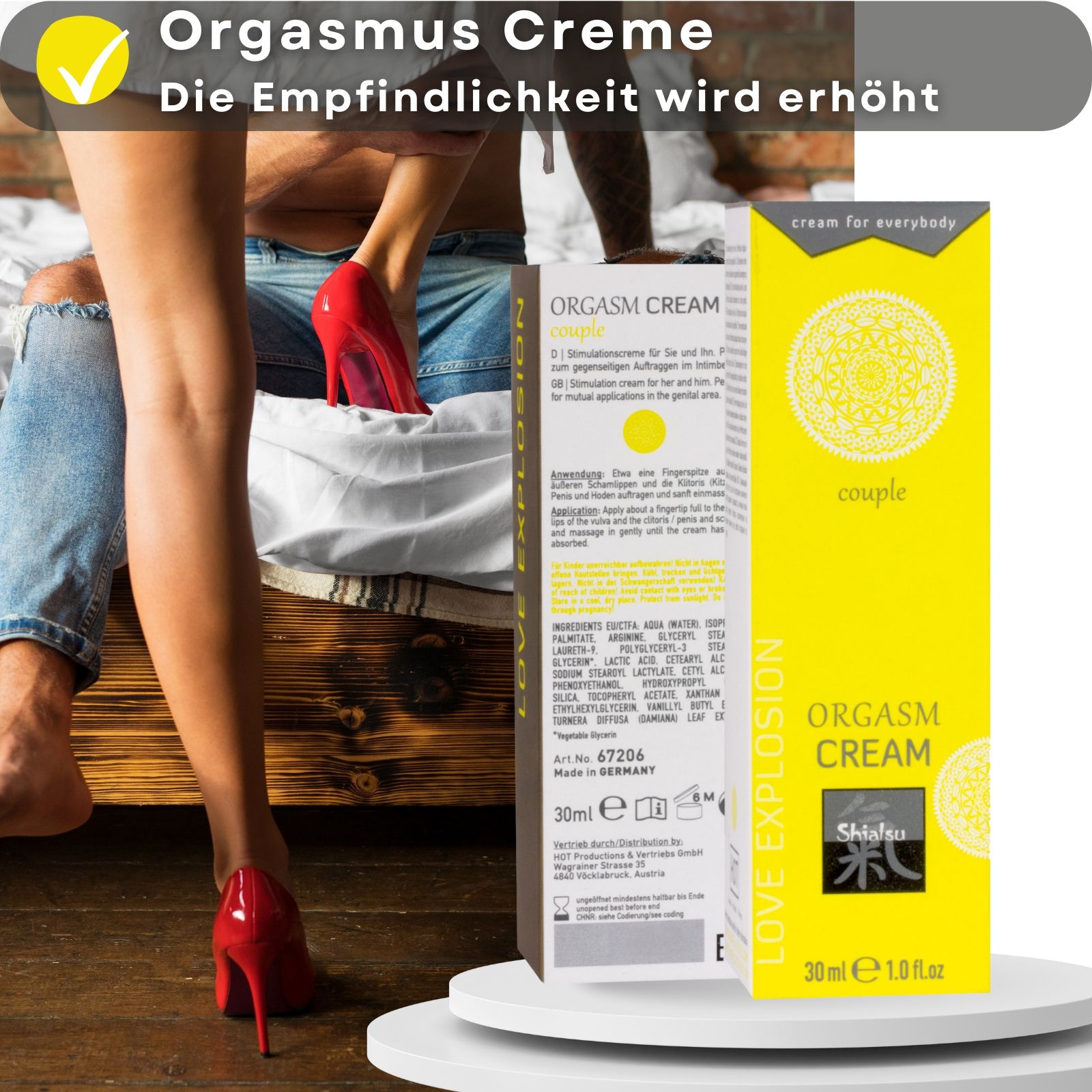 Gelbe Schachtel und Tube. Aufschrift: ORGASM CREAM, Shiatsu, 30 ml. Paar und rote Schuhe.