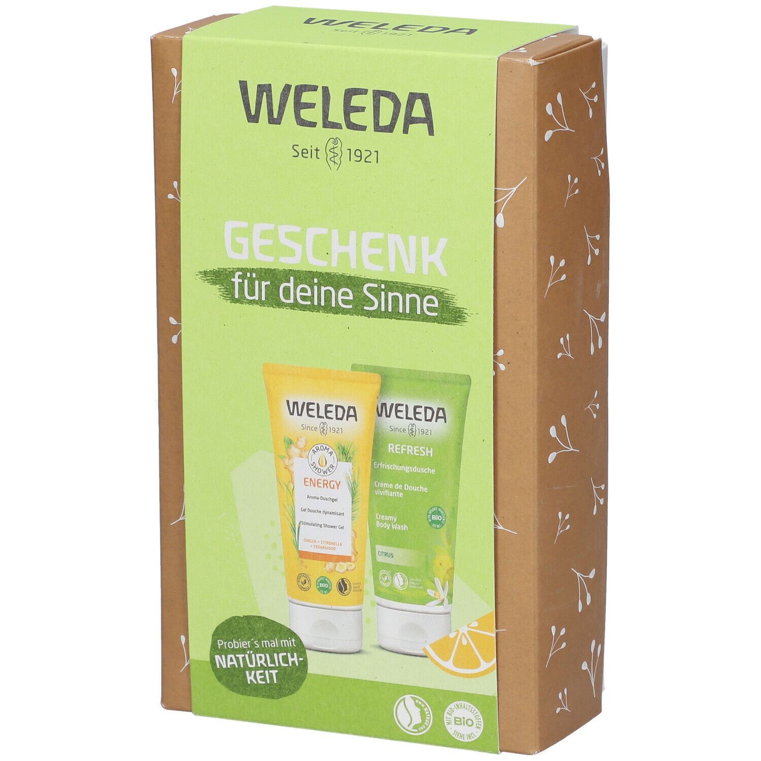 Geschenkset von Weleda. Karton mit zwei Tuben: Energy und Refresh. Aufschrift: Geschenk für deine Sinne. Bio-Zertifizierung.