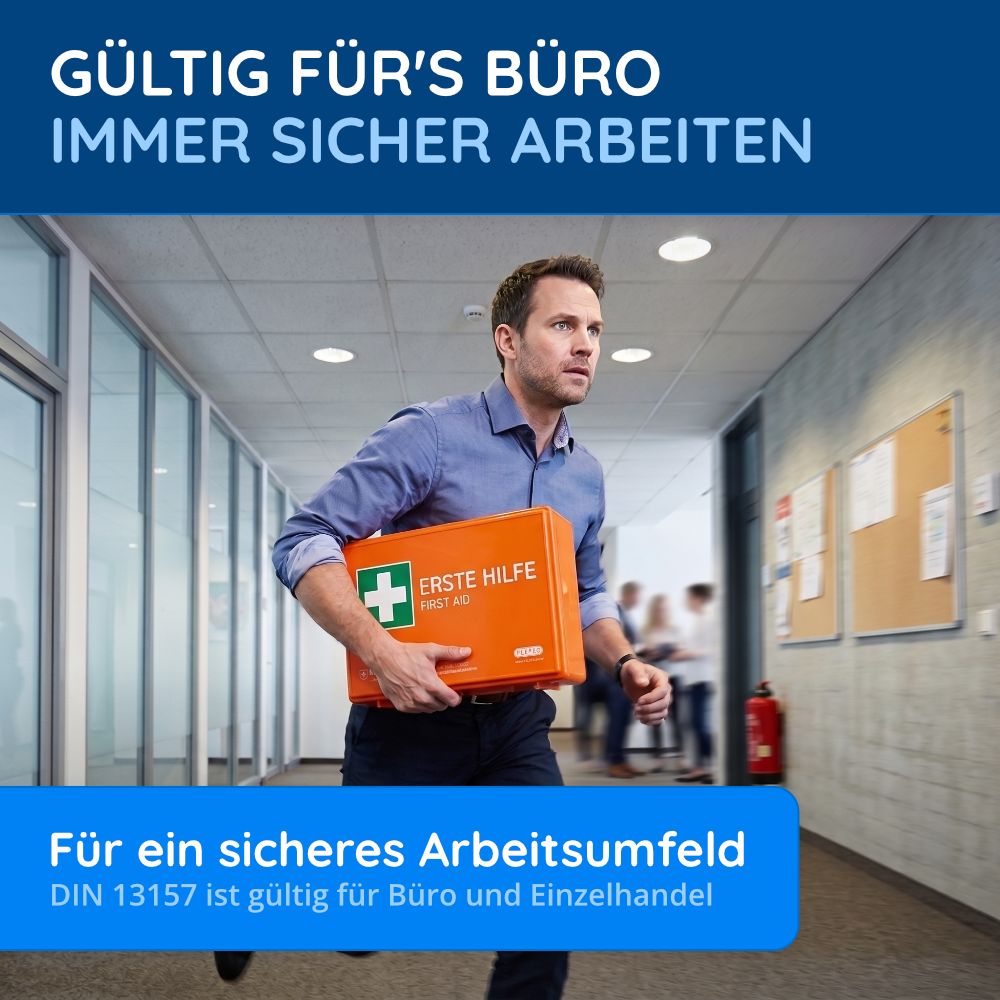 Mann rennt mit Erste Hilfe Kasten durch Büro. Text: Gültig fürs Büro. DIN 13157 für Büro und Einzelhandel.