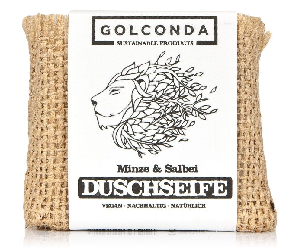 Duschseife in Jute verpackt. Auf weißem Etikett: Logo, Schriftzug GOLCONDA, Minze & Salbei, Duschseife, vegan, nachhaltig, natürlich.