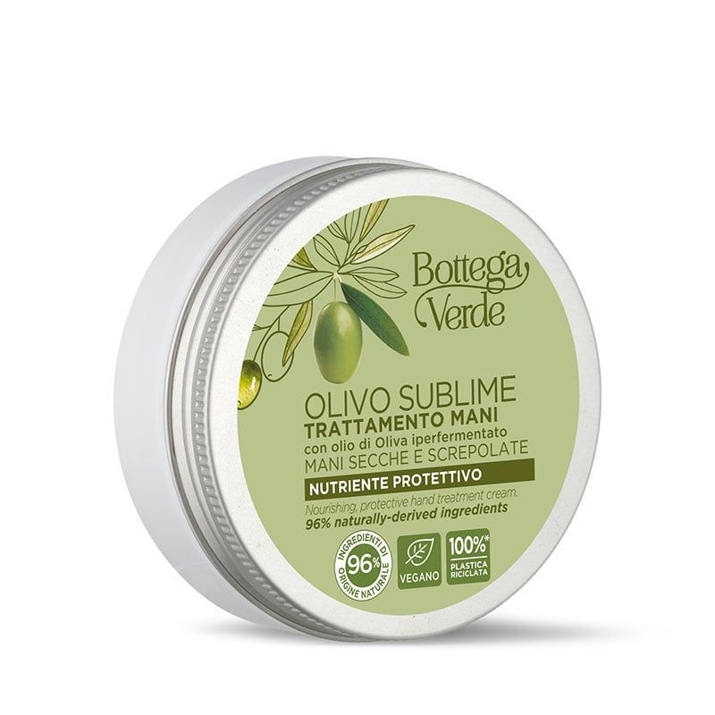 Confezione di crema mani Bottega Verde Olivo Sublime. Il contenitore rotondo ha un coperchio bianco e un bordo argentato. Sul coperchio sono visibili il logo e il nome del prodotto, insieme a informazioni sugli ingredienti e sulla formulazione.