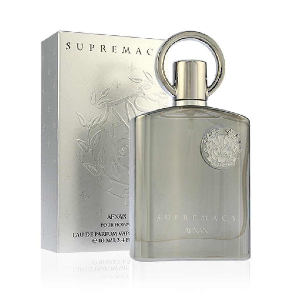 Silberne Parfumflasche und Verpackung. Flasche mit rundem Verschluss. Aufschrift: SUPREMACY, AFNAN, Eau de Parfum Vaporisateur. Geprägtes Logo.