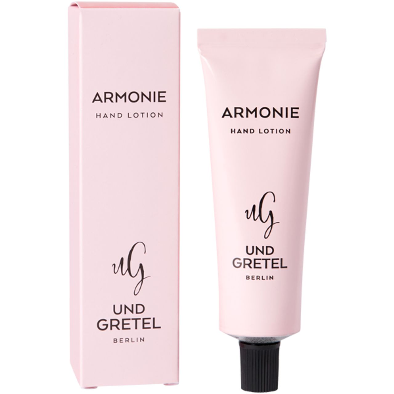 Rosa Tube und Schachtel. "Armonie Hand Lotion" und "Und Gretel Berlin" Schriftzug.