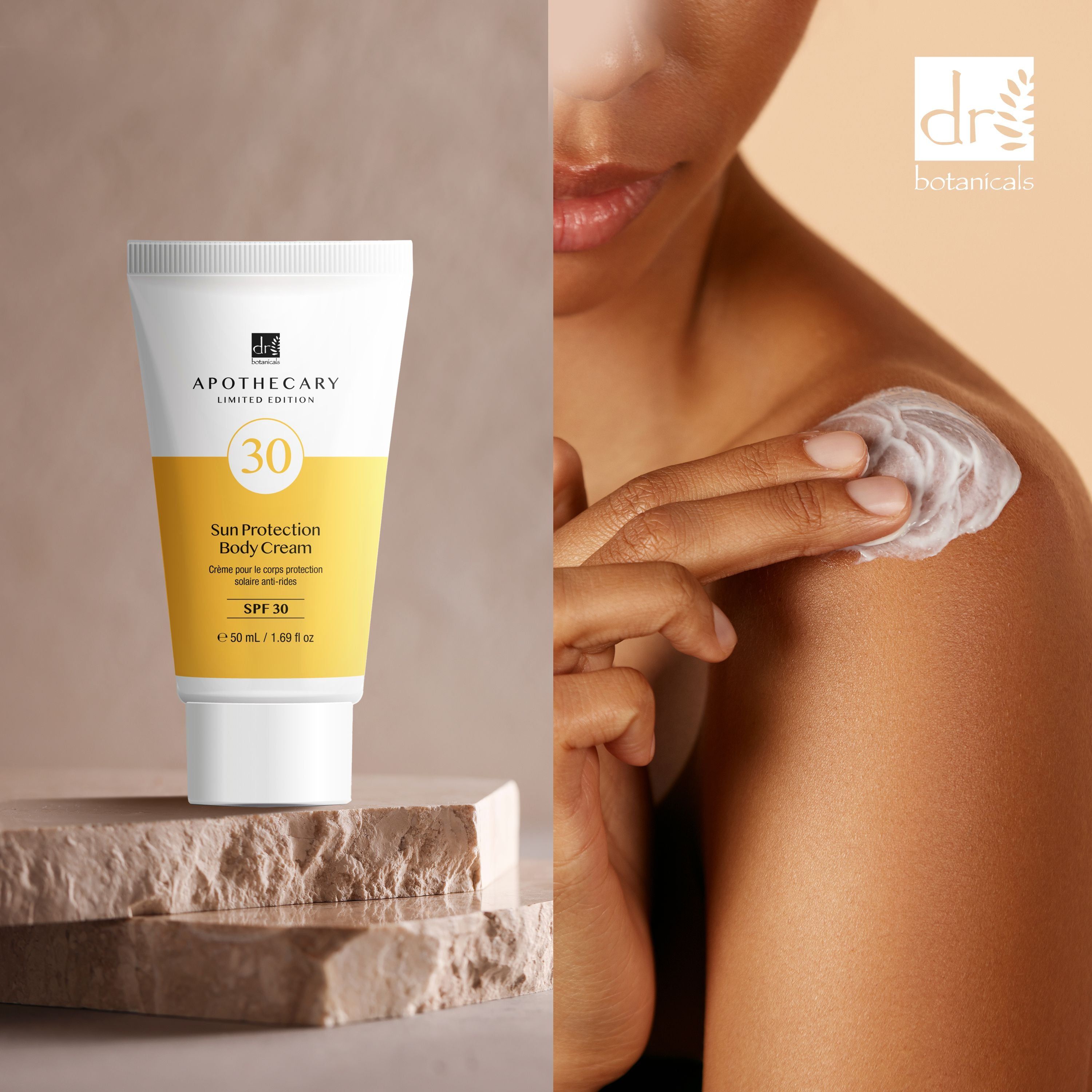 Weiße Tube mit gelbem Etikett. Aufschrift: Apothecary, SPF 30, Sun Protection Body Cream. Person trägt Creme auf die Schulter auf.