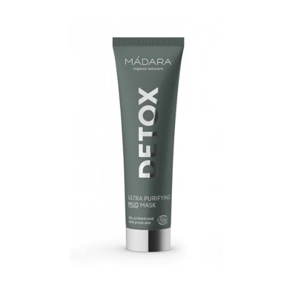 Graue Tube mit silberner Schrift. Beschriftung: DETOX, Ultra Purifying Mud Mask. Marke: MÁDARA. Mit Bio-Zertifizierung.