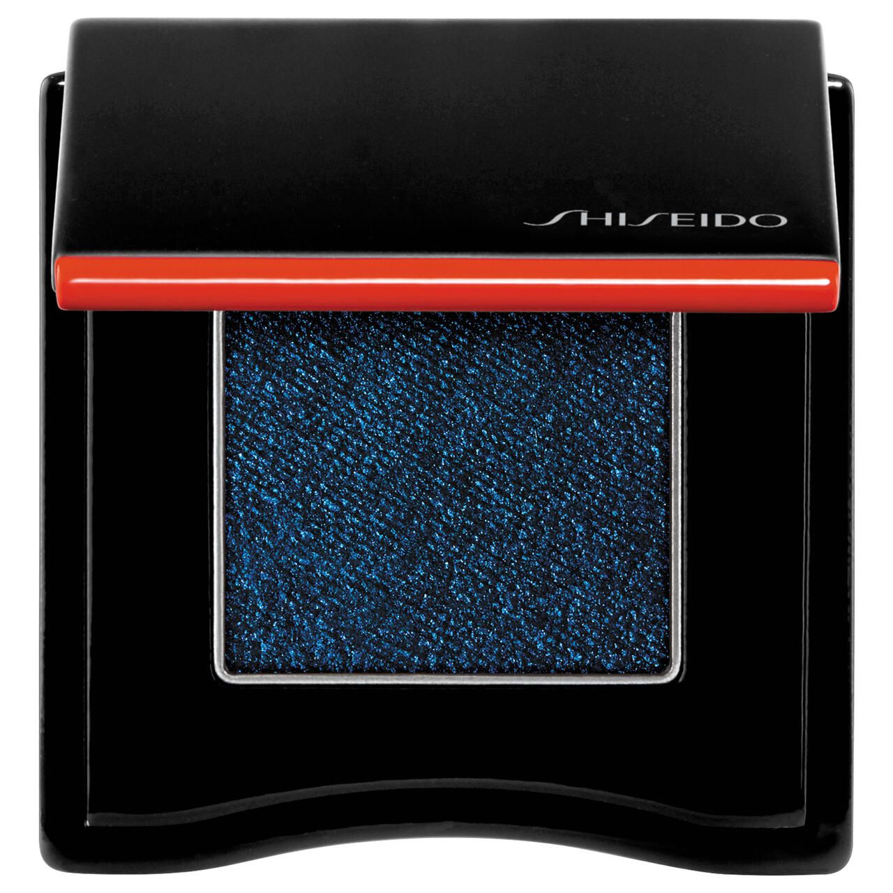 Shiseido Powder Gel Lidschatten. Schwarze Kompaktdose mit blauem Lidschatten. Roter Akzent. Marke sichtbar.