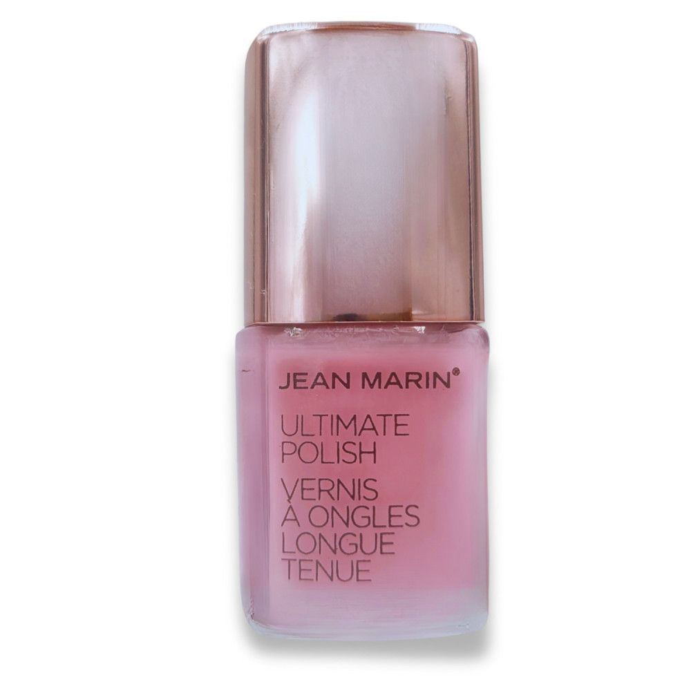 Nagellackflasche. Jean Marin Ultimate Polish. Rosa Farbe. Deckel in Roségold. Text: Vernis à ongles longue tenue.