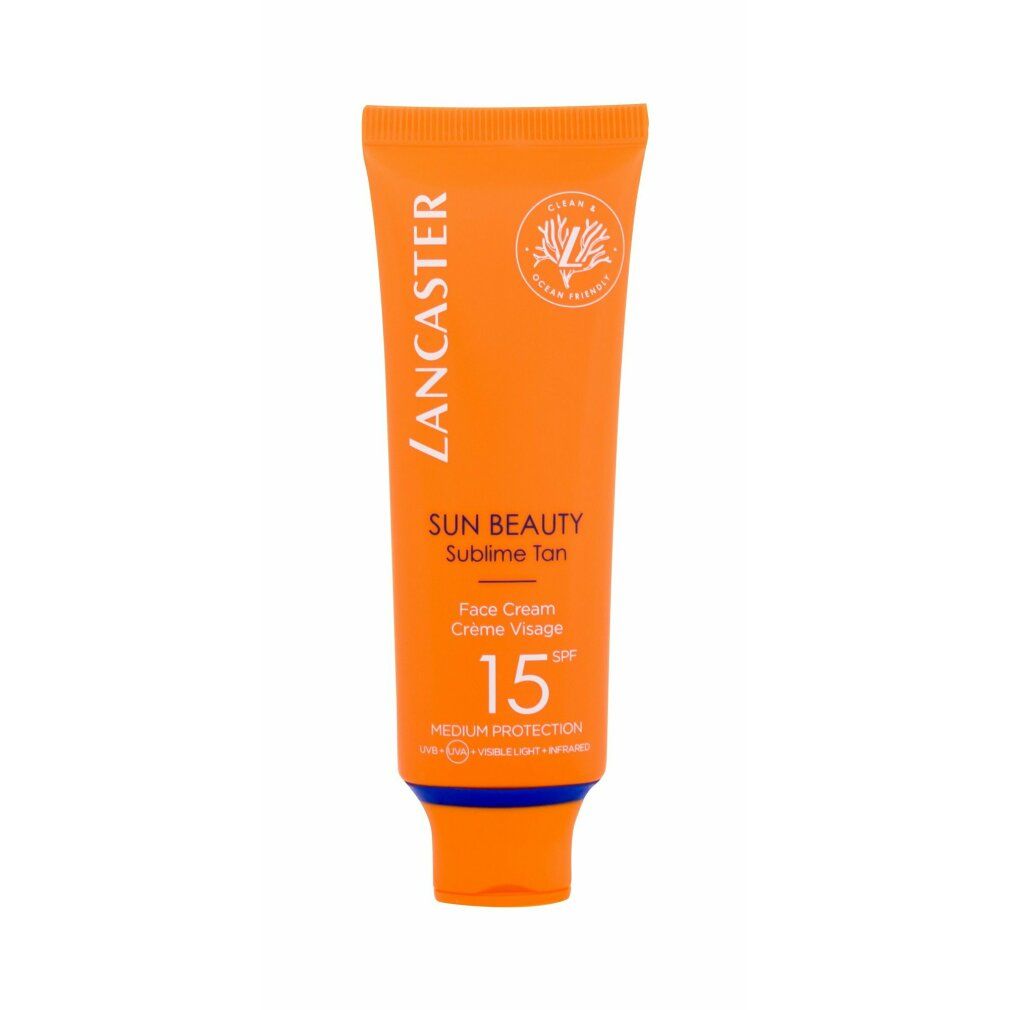 Orangefarbene Tube mit Produktinformationen. Text: Lancaster, Sun Beauty, SPF 15. 'Clean & Ocean Friendly'.