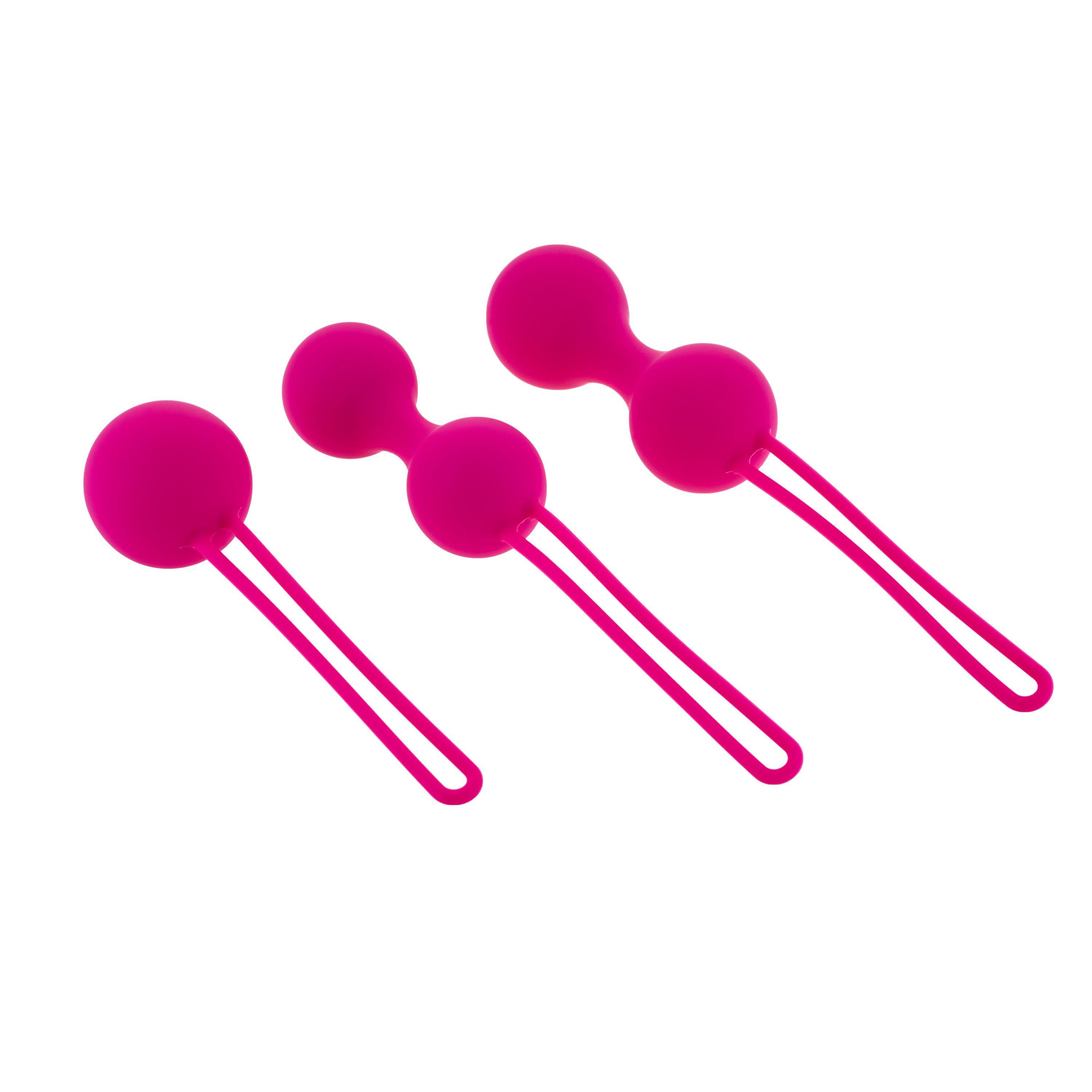 Drei rosafarbene Kugeln mit Schlaufen. Jede Kugel hat eine runde Form und ist durch einen schmalen Steg verbunden.