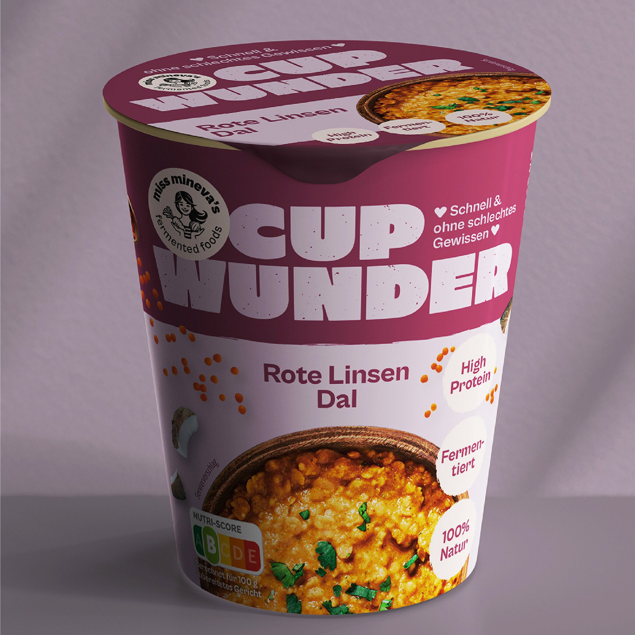 Cup Wunder Becher. Rote Linsen Dal. Aufdrucke: Miss Mineva's, Cup Wunder, High Protein, fermentiert, 100% Natur. Abbildung von Linsen.