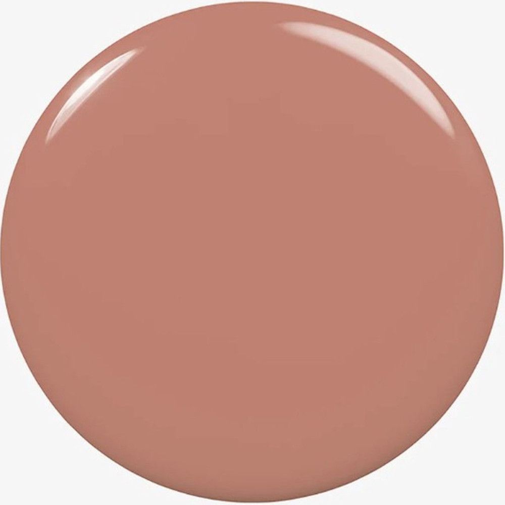 Kreisförmiger Nagellackfleck in Rosa-Braun-Ton. Glänzende Oberfläche.