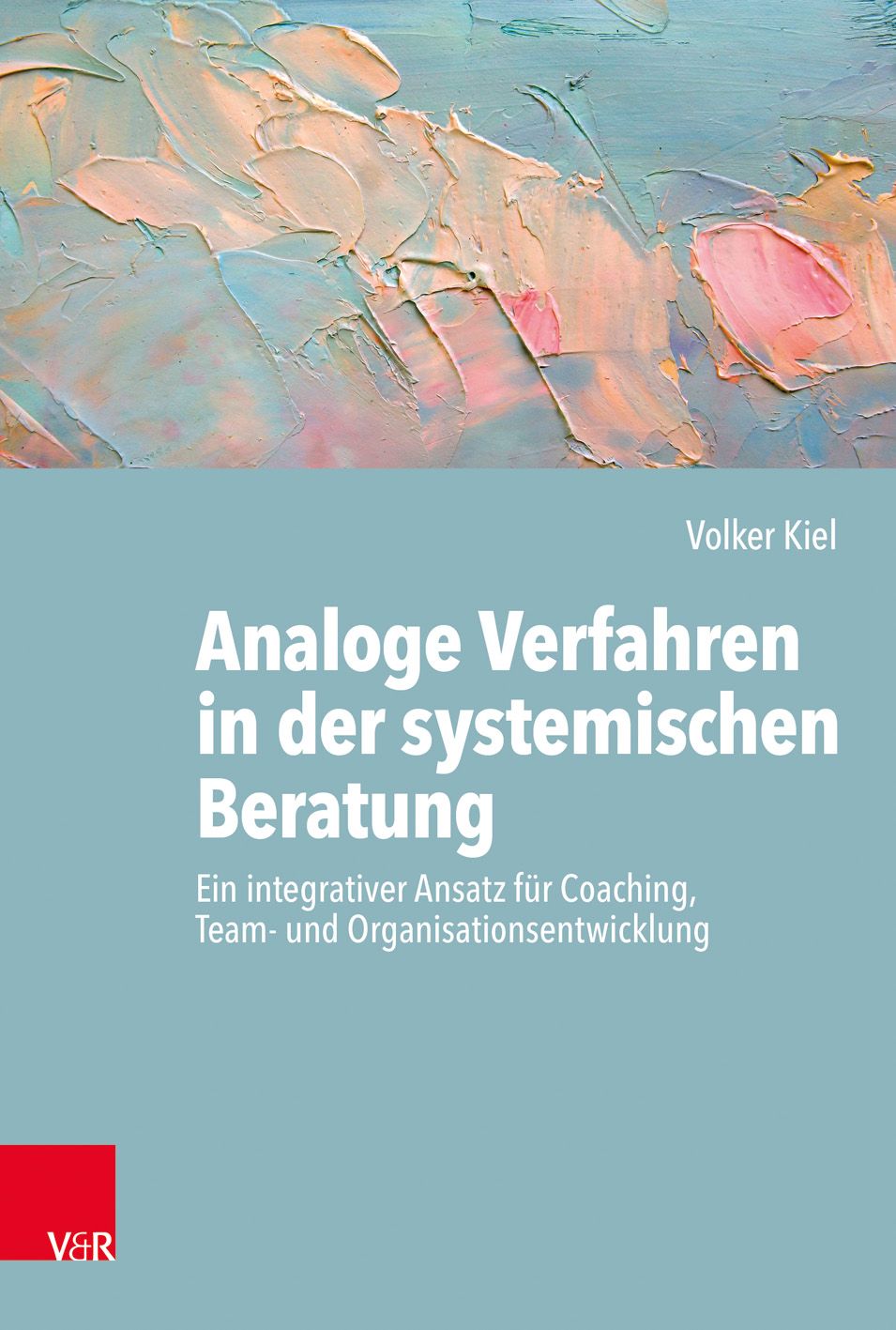 Buchcover mit Titel: Analoge Verfahren in der systemischen Beratung. Autor: Volker Kiel. Verlag: V&R. Hintergrund: abstrakte Malerei.