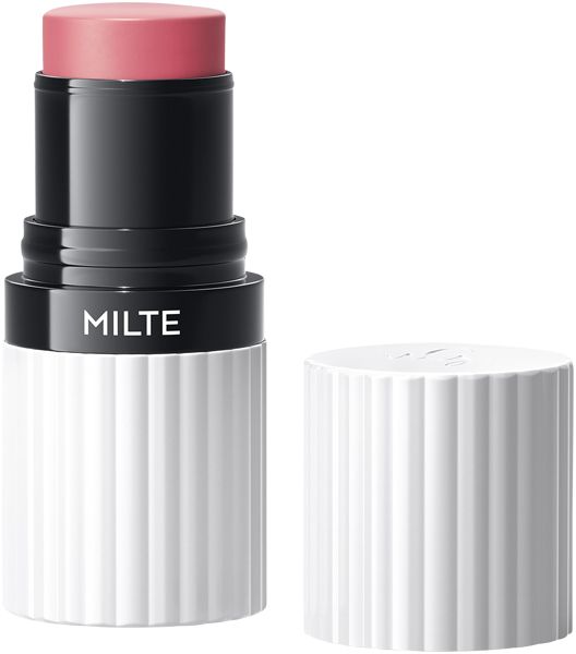 Blush-Multistick mit rosa Spitze, schwarzem Mittelteil und weißem, geriffeltem Gehäuse. Deckel daneben.