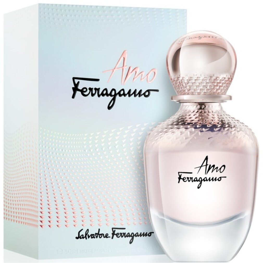 Rosafarbener Flakon und Verpackung von Amo Ferragamo. Flakon mit kugelförmigem Deckel und geriffelter Oberfläche. Verpackung mit Logo.