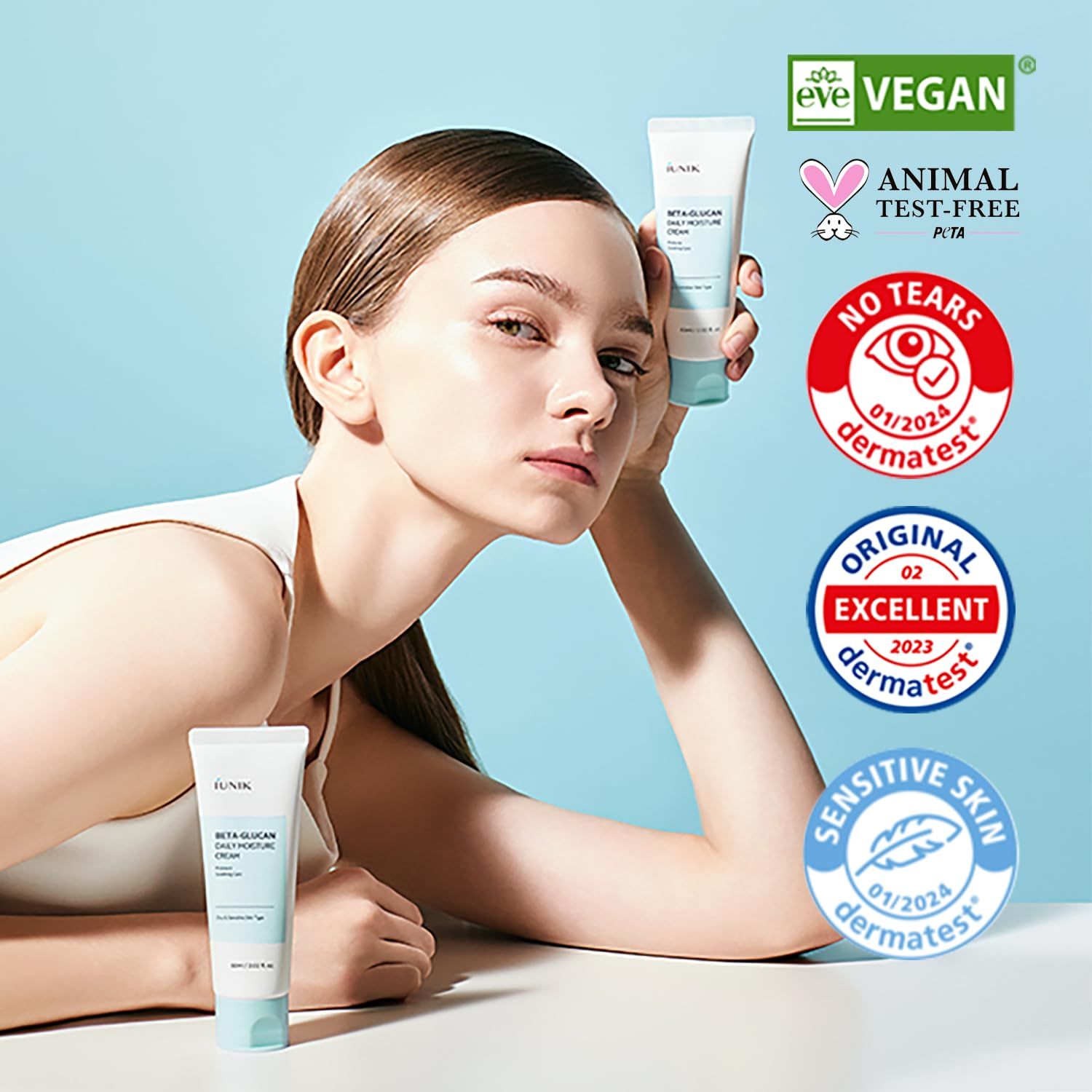 Frau mit iUNIK Beta Glucan Feuchtigkeitscreme, Siegel: Vegan, Tierversuchsfrei, Dermatest.