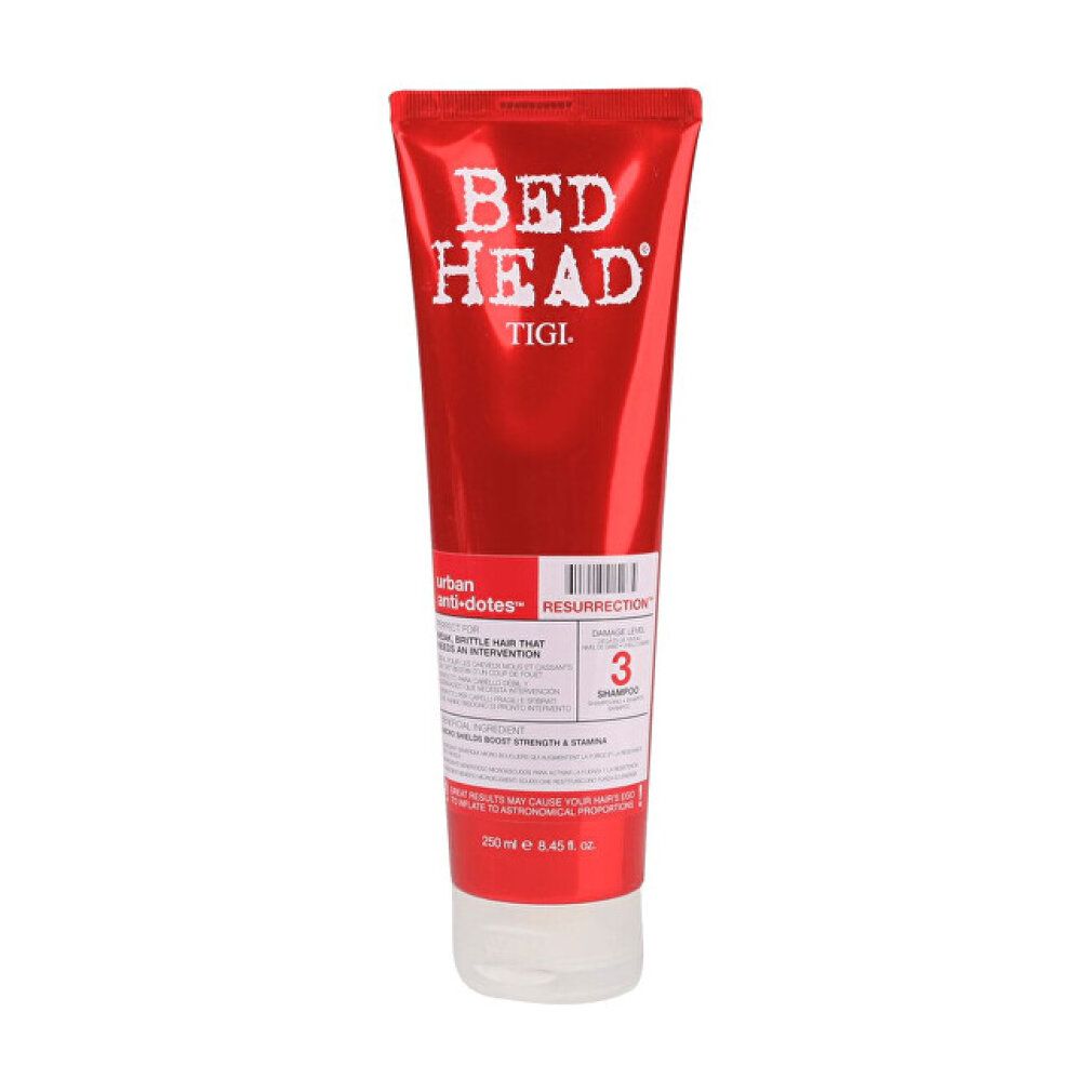 Rote Tube mit weißem Schriftzug "BED HEAD" und "TIGI". Produktname "RESURRECTION" und "3 SHAMPOOS".