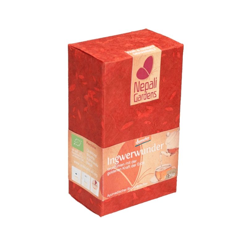 Rote rechteckige Verpackung mit Aufdruck. Oben links das Logo von Nepali Gardens. Auf der Verpackung steht "Ingwerwunder".