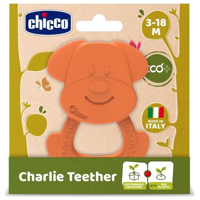 Orangefarbener Beißring in Hundeform. Verpackung mit Logo und Schriftzug "Charlie Teether". Hergestellt in Italien. Altersempfehlung: 3-18 Monate.