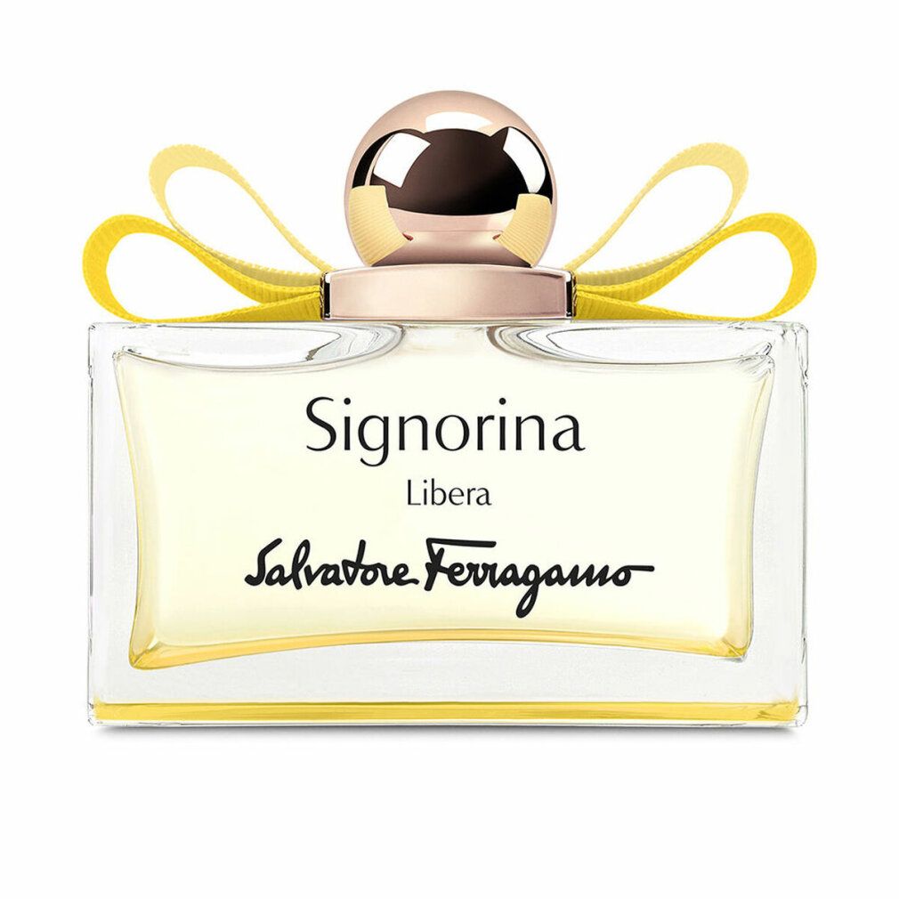 Salvatore Ferragamo Signorina Libera Eau de Parfum in einem rechteckigen Glasflakon mit gelbem Band und goldenem Verschluss.